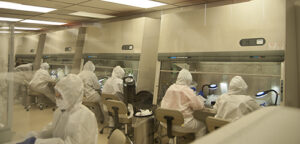workers in the DNA/RNA free cleanroom
